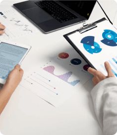 A business meeting with charts and graphs